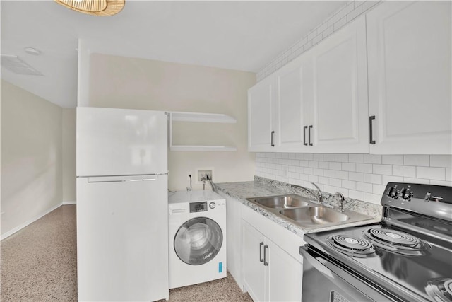 washroom with washer / clothes dryer and sink