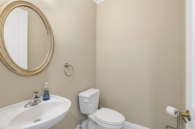 bathroom with sink and toilet