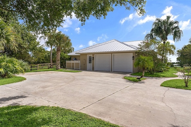 view of side of home with a garage