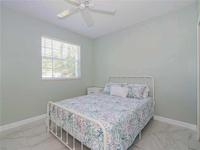 bedroom featuring ceiling fan