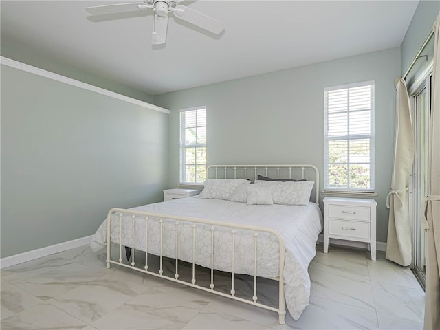 bedroom featuring ceiling fan