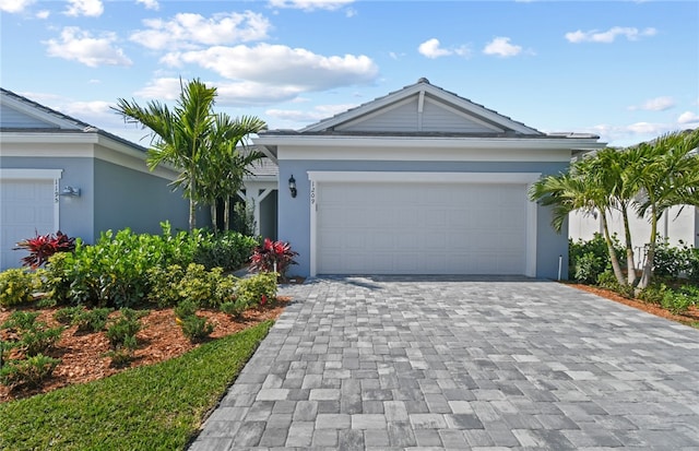 1209 Harper Way Unit 008, Vero Beach, FL 32960 - single story home featuring stucco siding, decorative driveway, and an attached garage