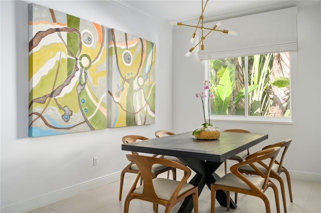 dining room featuring crown molding and a notable chandelier