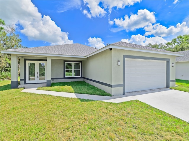 ranch-style house with french doors, a front yard, and a garage