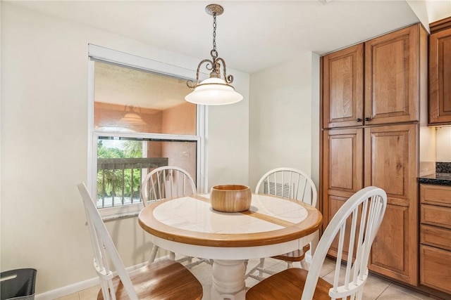 dining room with light tile patterned floors