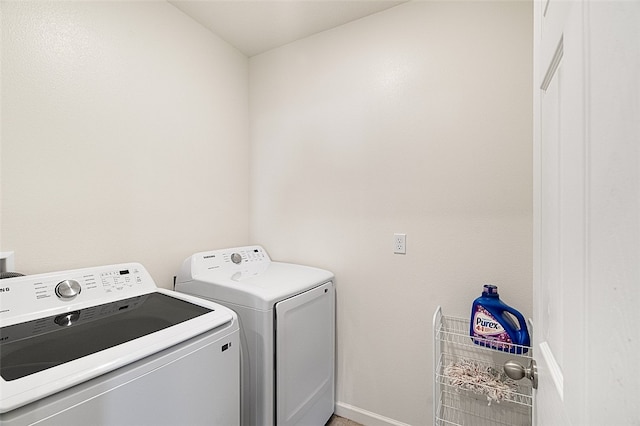 laundry area with washer and clothes dryer