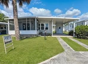 939 Laurel Cir, Barefoot Bay, FL 32976 - photo 1
