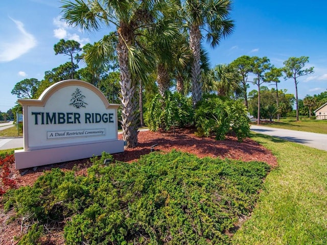 636 Centre Ct SW Unit 102, Vero Beach, FL 32962 - community sign with a lawn