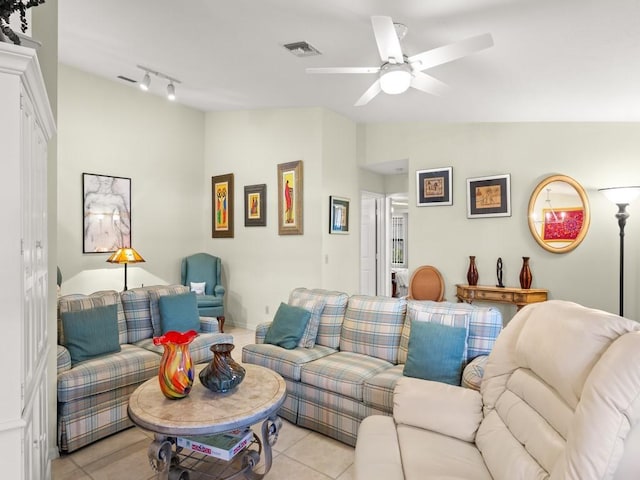 636 Centre Ct SW Unit 102, Vero Beach, FL 32962 - living area featuring lofted ceiling, a ceiling fan, light tile patterned flooring, and rail lighting