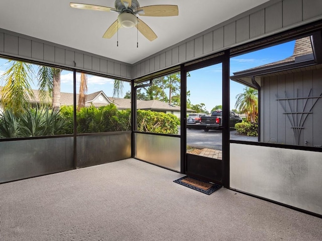 636 Centre Ct SW Unit 102, Vero Beach, FL 32962 - unfurnished sunroom featuring a ceiling fan