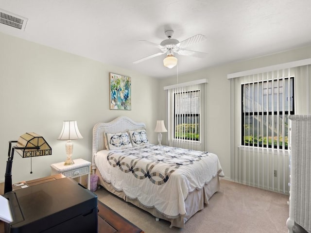 636 Centre Ct SW Unit 102, Vero Beach, FL 32962 - carpeted bedroom featuring a ceiling fan