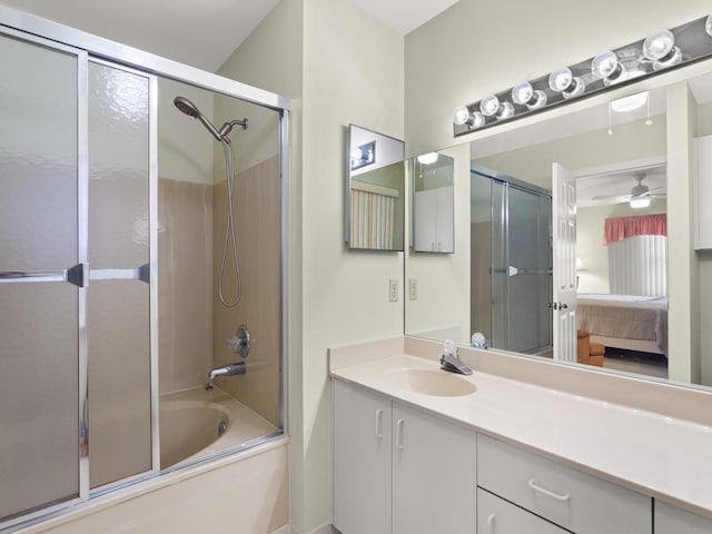 636 Centre Ct SW Unit 102, Vero Beach, FL 32962 - ensuite bathroom with shower / bath combination with glass door, vanity, and ceiling fan