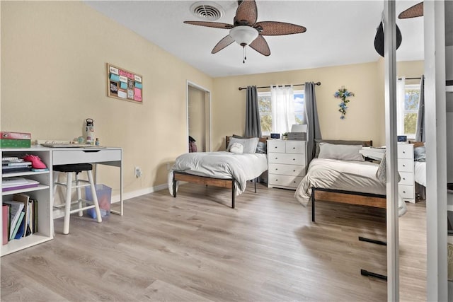 bedroom featuring ceiling fan and light hardwood / wood-style flooring