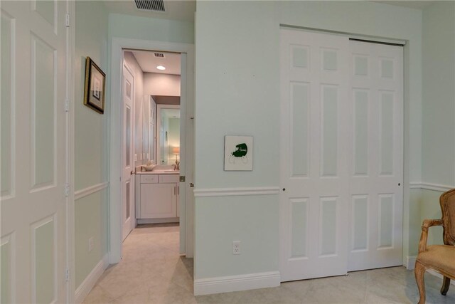 6005 Bella Rosa Ln, Vero Beach, FL 32966 - corridor with baseboards