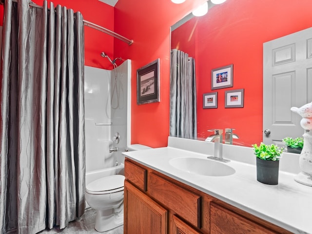 full bathroom featuring vanity, shower / bath combination with curtain, and toilet