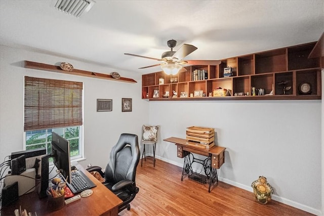 office area featuring wood-type flooring and ceiling fan