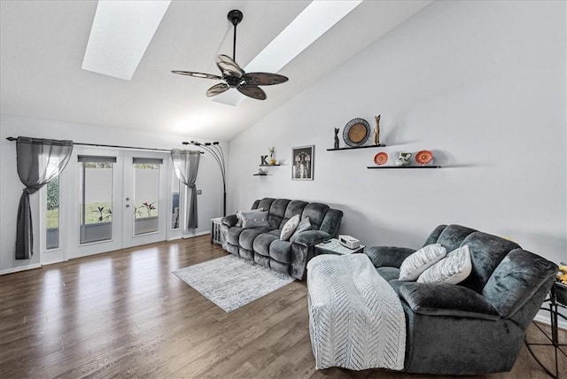 living room with high vaulted ceiling, french doors, a skylight, ceiling fan, and wood-type flooring