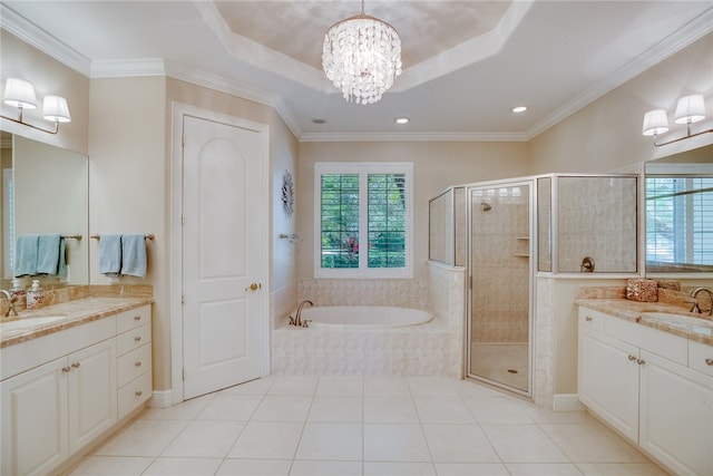 bathroom with independent shower and bath, crown molding, and a notable chandelier