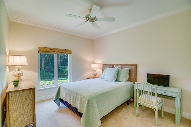 bedroom with ceiling fan, light carpet, and ornamental molding