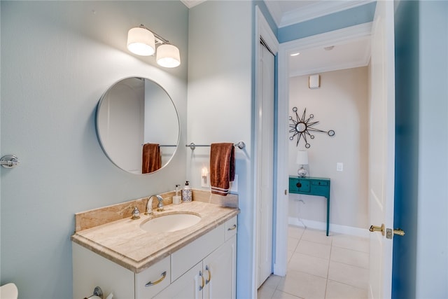 bathroom featuring vanity, tile patterned floors, and crown molding