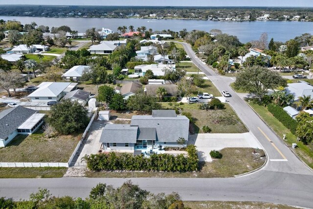 single story home with a garage and a front yard