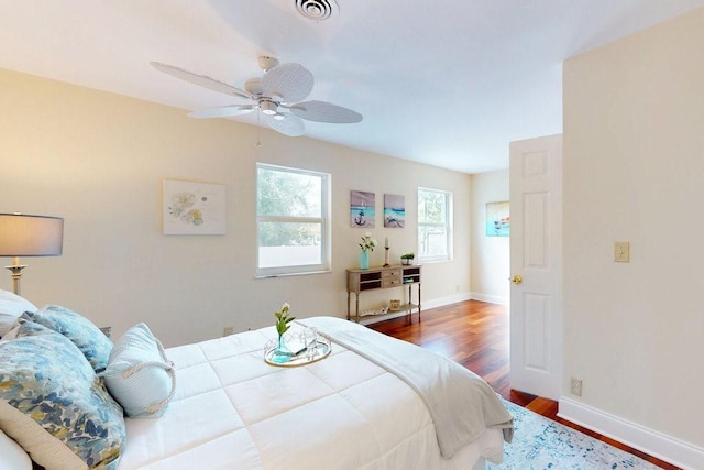 bedroom featuring hardwood / wood-style flooring and ceiling fan