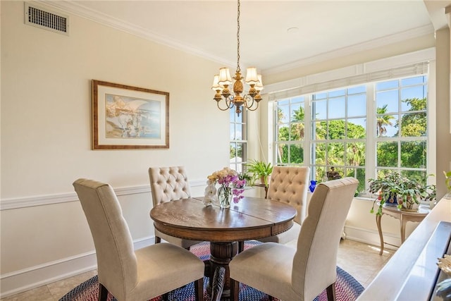 1250 W Southwinds Blvd Unit 310, Vero Beach, FL 32963 - dining space featuring a chandelier, ornamental molding, and light tile patterned floors