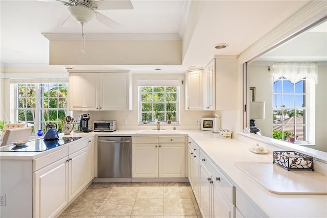1250 W Southwinds Blvd Unit 310, Vero Beach, FL 32963 - kitchen with stainless steel dishwasher, black electric stovetop, crown molding, light countertops, and ceiling fan