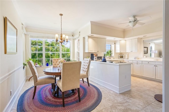 1250 W Southwinds Blvd Unit 310, Vero Beach, FL 32963 - dining room with crown molding, a chandelier, a ceiling fan, and light tile patterned flooring