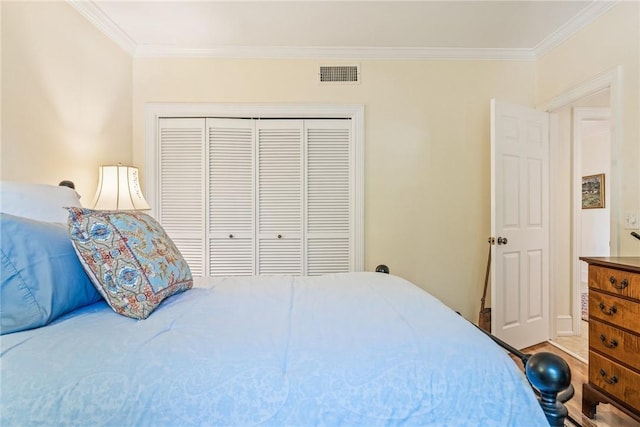 1250 W Southwinds Blvd Unit 310, Vero Beach, FL 32963 - bedroom with ornamental molding and a closet