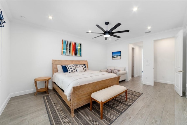6354 Arcadia Sq, Vero Beach, FL 32966 - bedroom featuring ornamental molding, light wood finished floors, baseboards, recessed lighting, and a ceiling fan