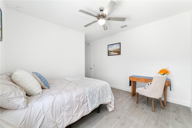 6354 Arcadia Sq, Vero Beach, FL 32966 - bedroom featuring light wood-type flooring, ceiling fan, and baseboards