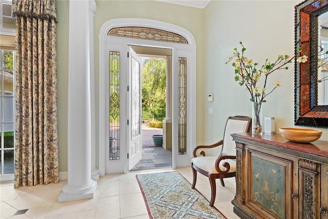 1080 Carolina Cir SW, Vero Beach, FL 32962 - entrance foyer featuring decorative columns, plenty of natural light, and tile patterned flooring