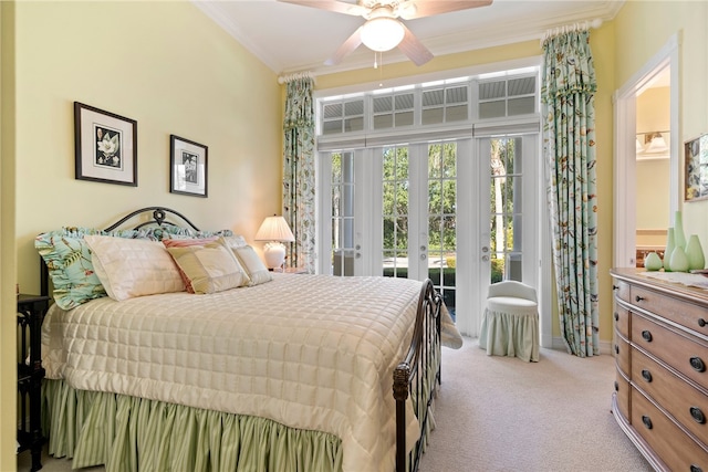 bedroom with ornamental molding, access to outside, light colored carpet, and ceiling fan