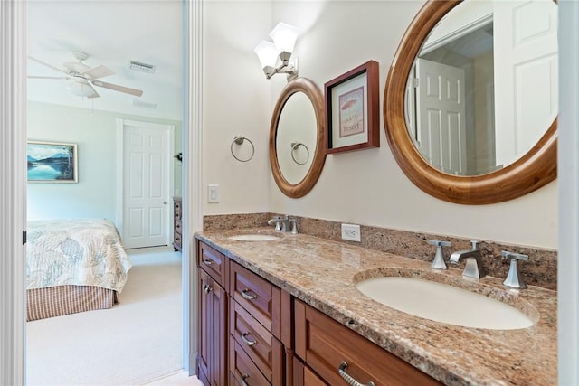 1080 Carolina Cir SW, Vero Beach, FL 32962 - full bathroom featuring double vanity, ensuite bathroom, and a ceiling fan
