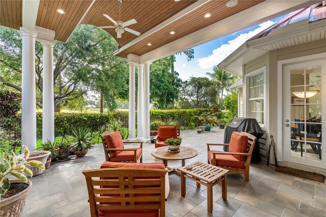 view of patio featuring area for grilling and ceiling fan