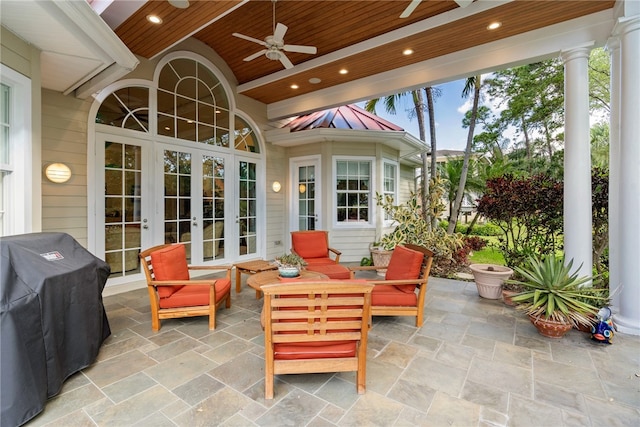 view of patio with ceiling fan, a grill, and french doors