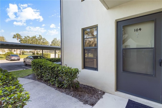 12 Plantation Dr Unit 104, Vero Beach, FL 32966 - entrance to property with stucco siding