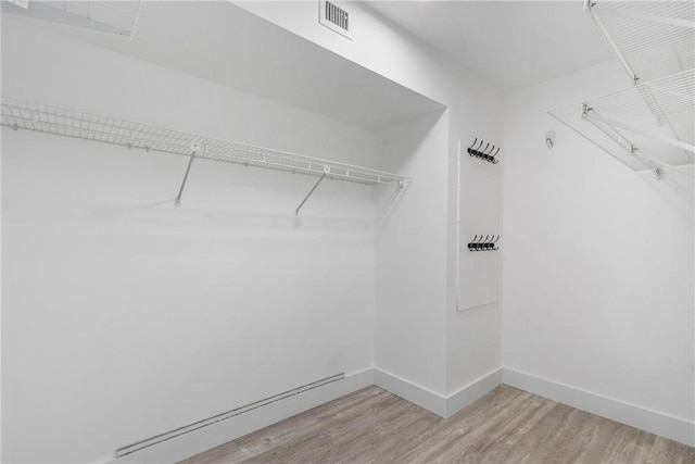 12 Plantation Dr Unit 104, Vero Beach, FL 32966 - walk in closet featuring light wood-type flooring