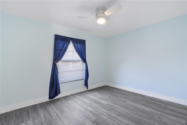 12 Plantation Dr Unit 104, Vero Beach, FL 32966 - empty room featuring wood finished floors, ceiling fan, and baseboards