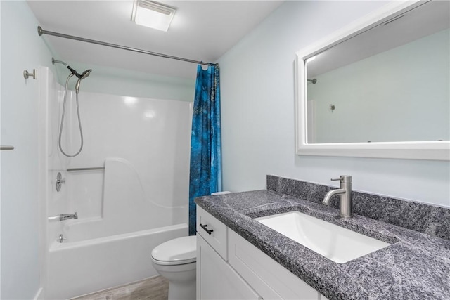12 Plantation Dr Unit 104, Vero Beach, FL 32966 - bathroom with toilet, shower / bath combo, vanity, and wood finished floors