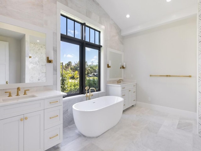 bathroom featuring a bathtub and vanity