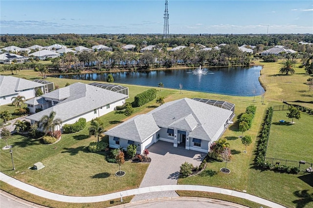 birds eye view of property featuring a water view