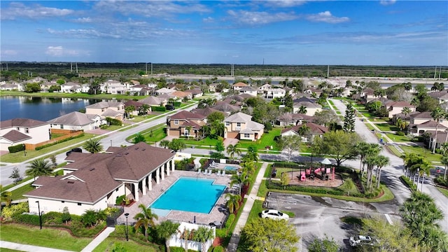 birds eye view of property with a residential view