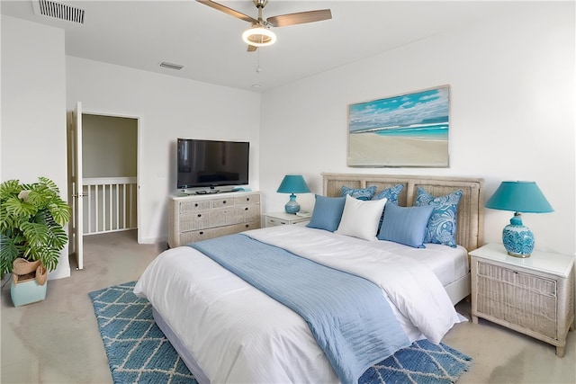 10011 W Villa Cir, Vero Beach, FL 32966 - bedroom with visible vents, a ceiling fan, and carpet floors