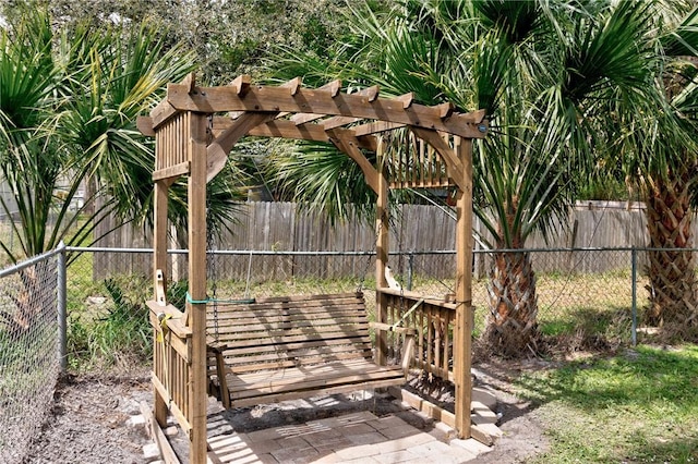 view of yard featuring a fenced backyard and a pergola