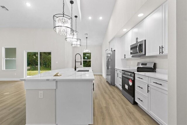 unfurnished living room featuring a tray ceiling, ceiling fan, and dark wood-type flooring