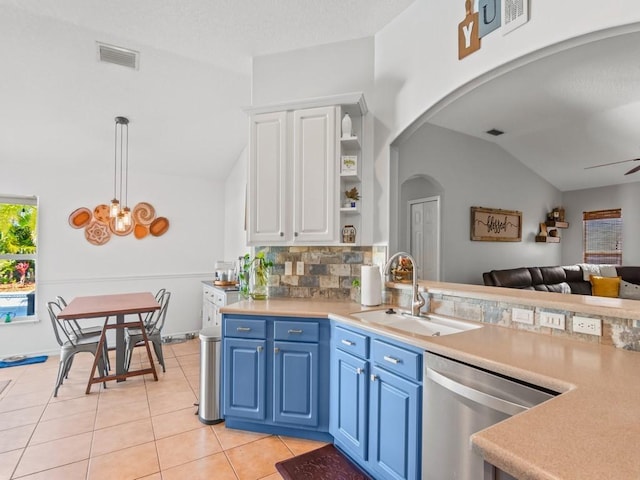 kitchen with blue cabinets, a sink, open shelves, open floor plan, and dishwasher