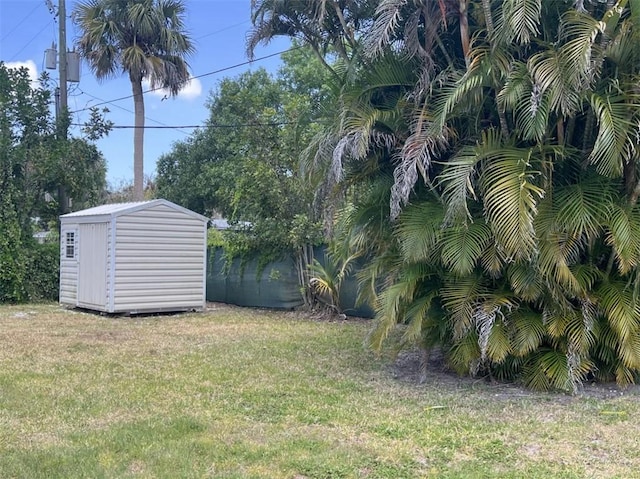 view of yard with a shed and an outdoor structure