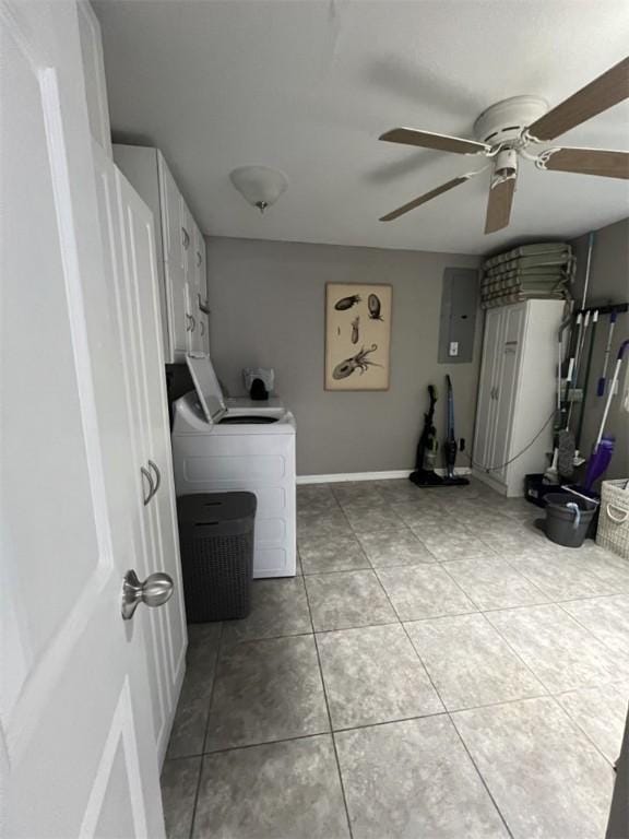 washroom featuring washer / dryer, ceiling fan, light tile patterned floors, and electric panel